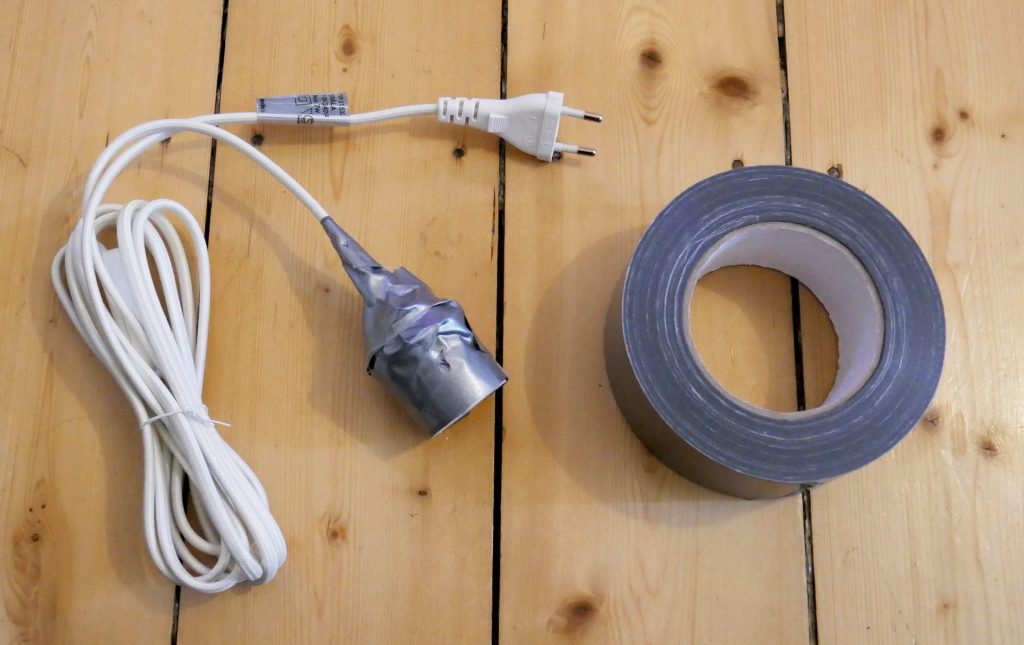 Isolierband um Lampenfassung