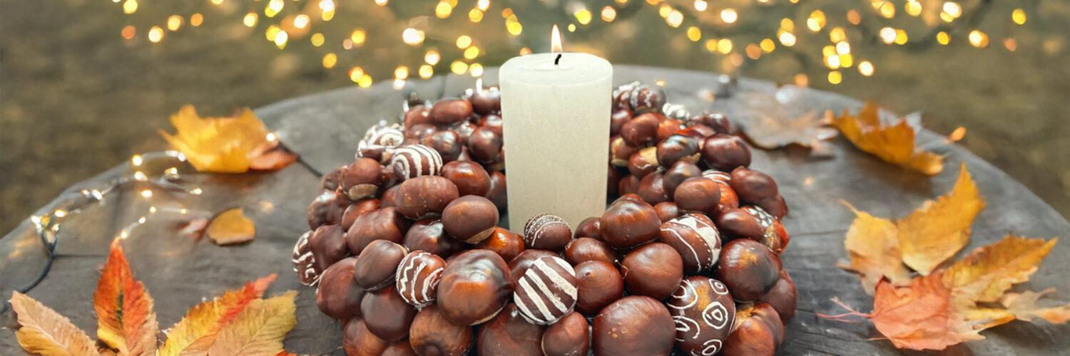 Kranz aus Kastanien mit Kerze